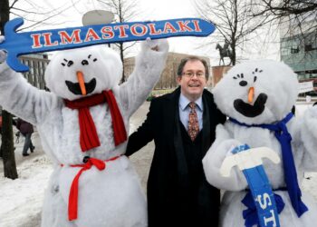 Vasemmistoliiton kansanedustaja Pentti Tiusanen ilmastonmuutosta vastustavassa mielenosoituksessa maaliskuussa 2009.
