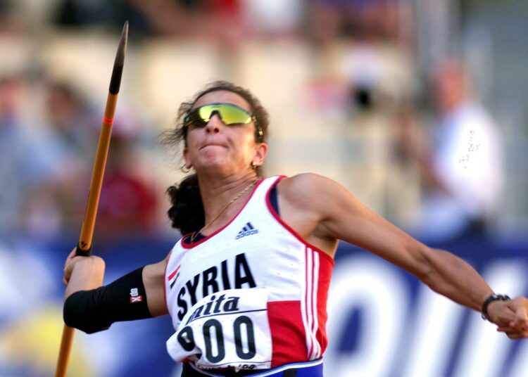 Seitsenottelija Ghada Shouaa maailmanmestaruuskisoissa Sevillassa vuonna 1999.