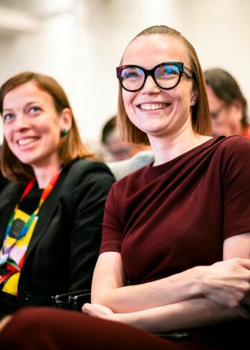 Vasemmistoliiton puheenjohtaja Minja Koskelalla on syytä hymyyn.