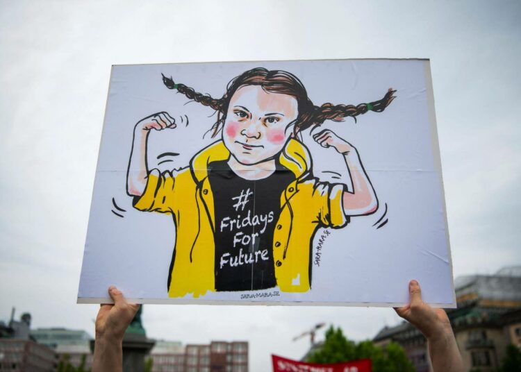 Greta Thunbergia verrattiin Peppi Pitkätossuun Tukholman suurella ilmastomarssilla 24. toukokuuta.