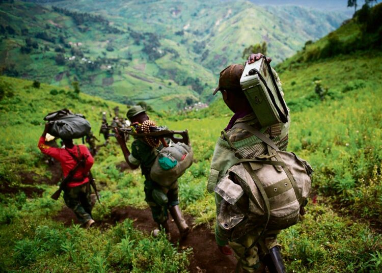 Kongolaisen kapinallisliikkeen M23:n sotilaat vetäytyivät joulukuun alussa Goman kaupungista ja vaelsivat korkeiden kukkuloiden ylitse takaisin tukikohtiinsa.