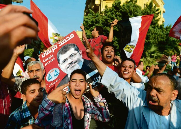 Muslimiveljeskunnan kannattajat juhlivat viime sunnuntaina Kairossa Mohammed Mursin vaalivoittoa Egyptin ensimmäisissä vapaissa presidentinvaaleissa.