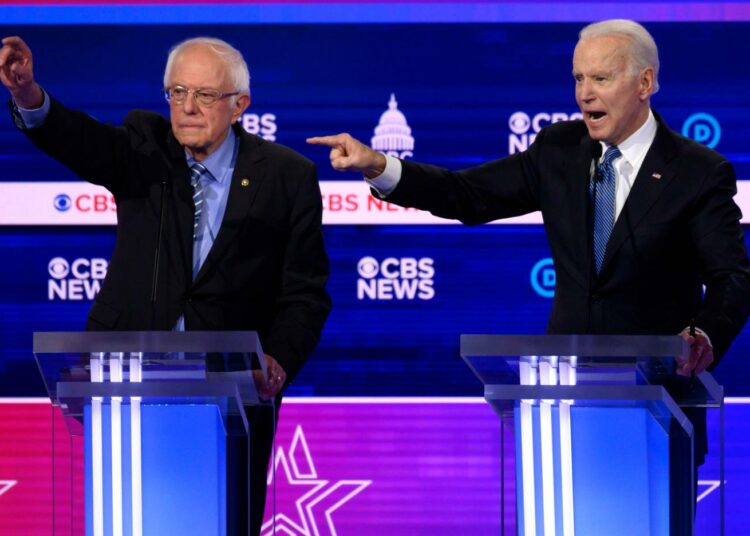 Demokraattipuolueen presidenttiehdokkuudesta kisaavat nyt kovimmin Bernie Sanders (vas) ja Joe Biden.