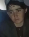 Kuvakaappaus kuulusteluvideosta, jossa näkyy 13-vuotias Nooria.