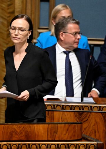 Vasemmistoliiton puheenjohtaja Minja Koskela, pääministeri Petteri Orpo (kok.) ja valtiovarainministeri Riikka Purra (ps.) eduskunnassa heinäkuussa.