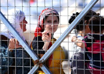 Syyriasta paenneita kurdinaisia Irakin Kurdistanissa Arbilin lähistöllä sijaitsevalla Qushtapan pakolaisleirillä.