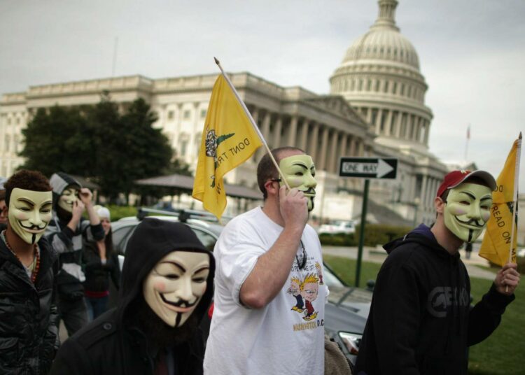 Occupy-liikkeen aktivisteja osallistui Miljoonan naamion marssiin Washingtonissa Guy Fawkesin päivänä, 5. marraskuuta.